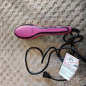 Illustra hair staightner pink. Gently used